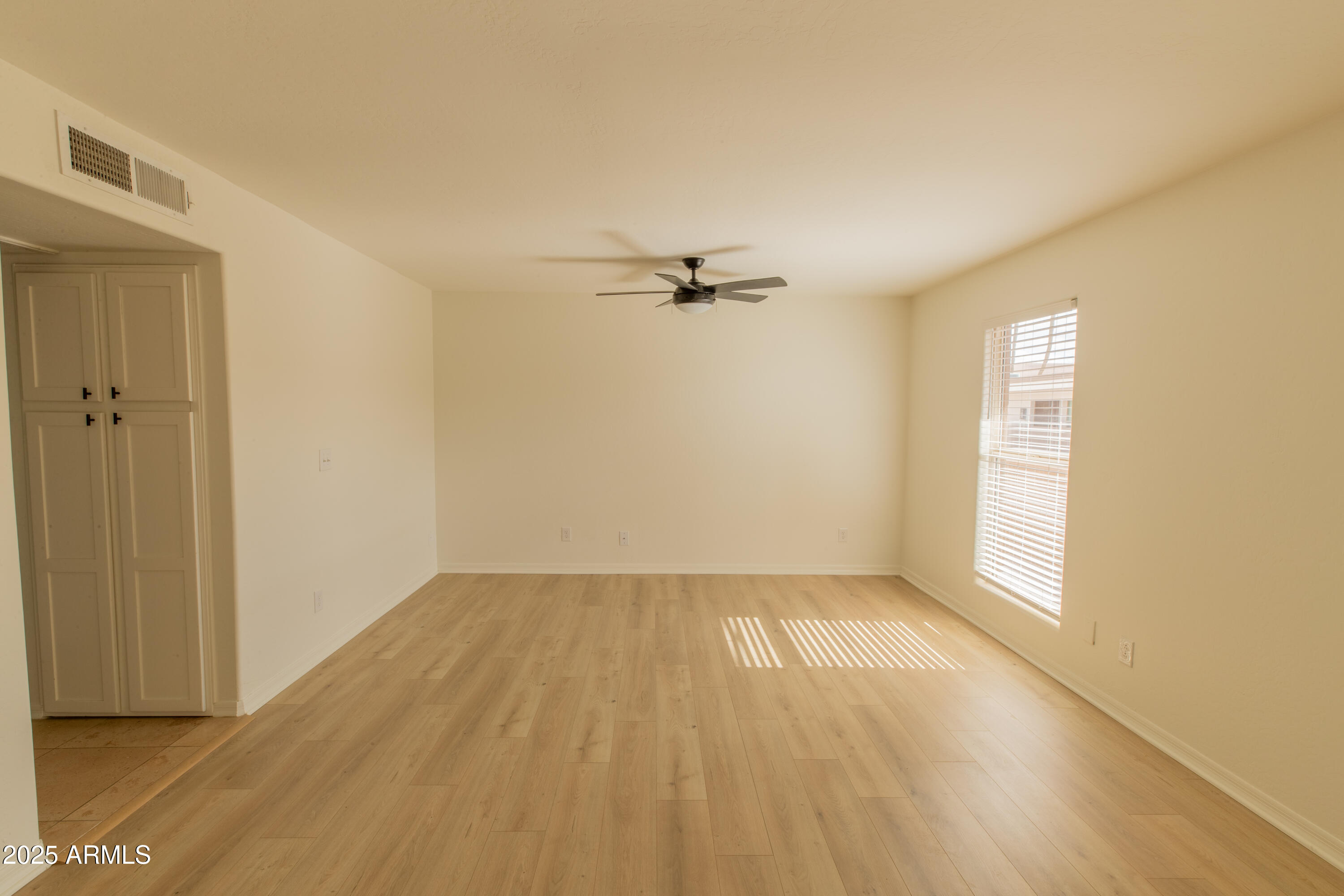 3619 East Monterosa Street, Unit 202 Phoenix, AZ 85018 - Photo 13 of 20 a view of a room with a window