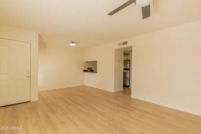 a view of a storage & utility room with a sink
