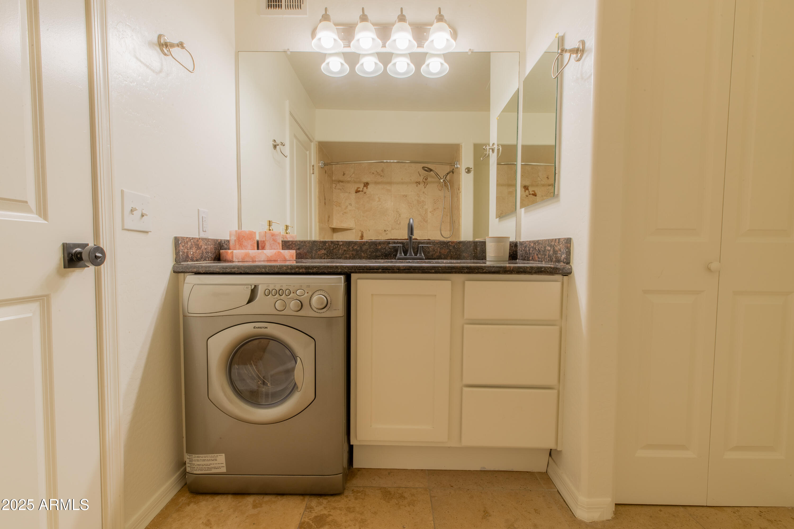 3619 East Monterosa Street, Unit 202 Phoenix, AZ 85018 - Photo 18 of 20 a view of a hallway with washer and dryer