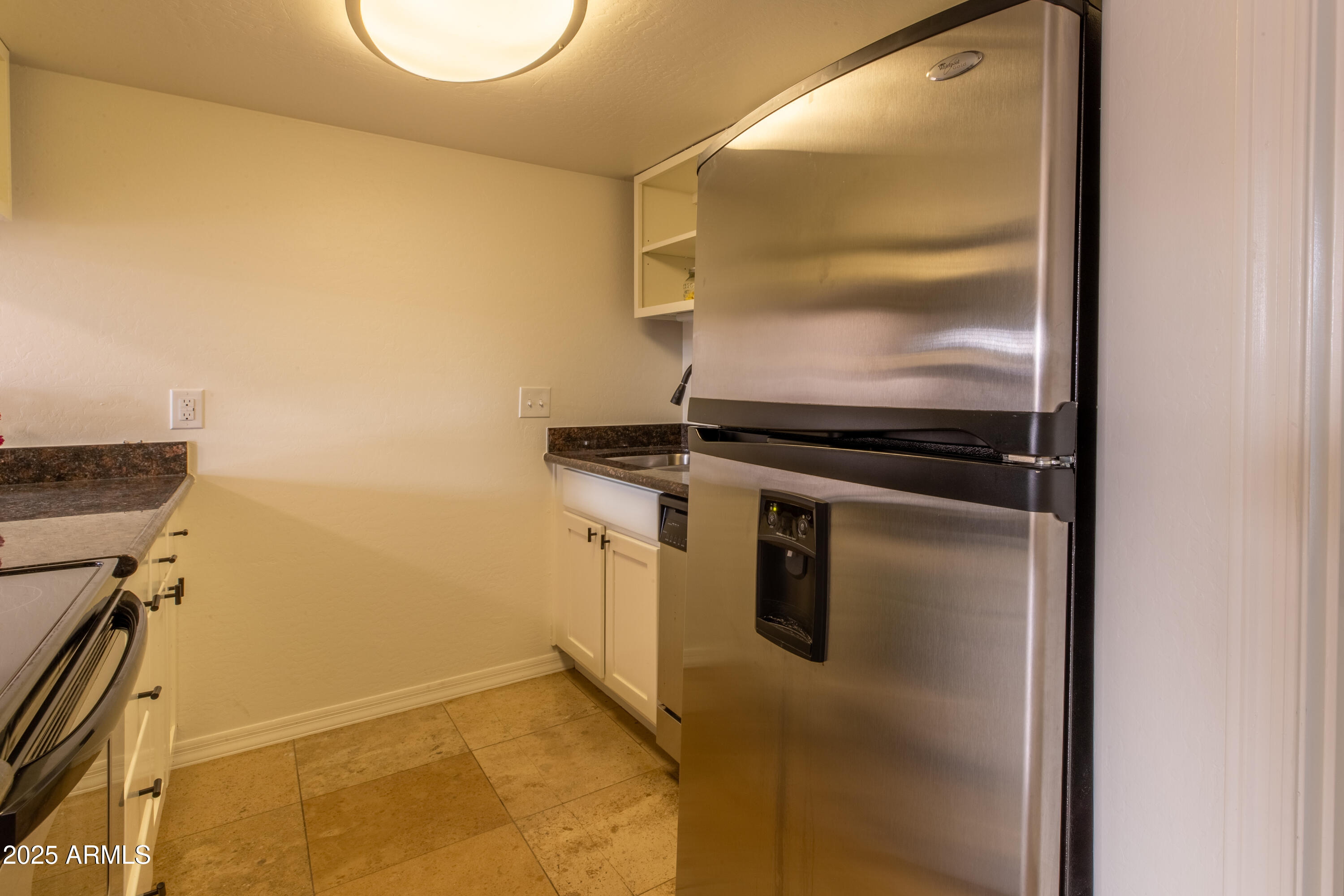 3619 East Monterosa Street, Unit 202 Phoenix, AZ 85018 - Photo 4 of 20 a view of a storage & utility room