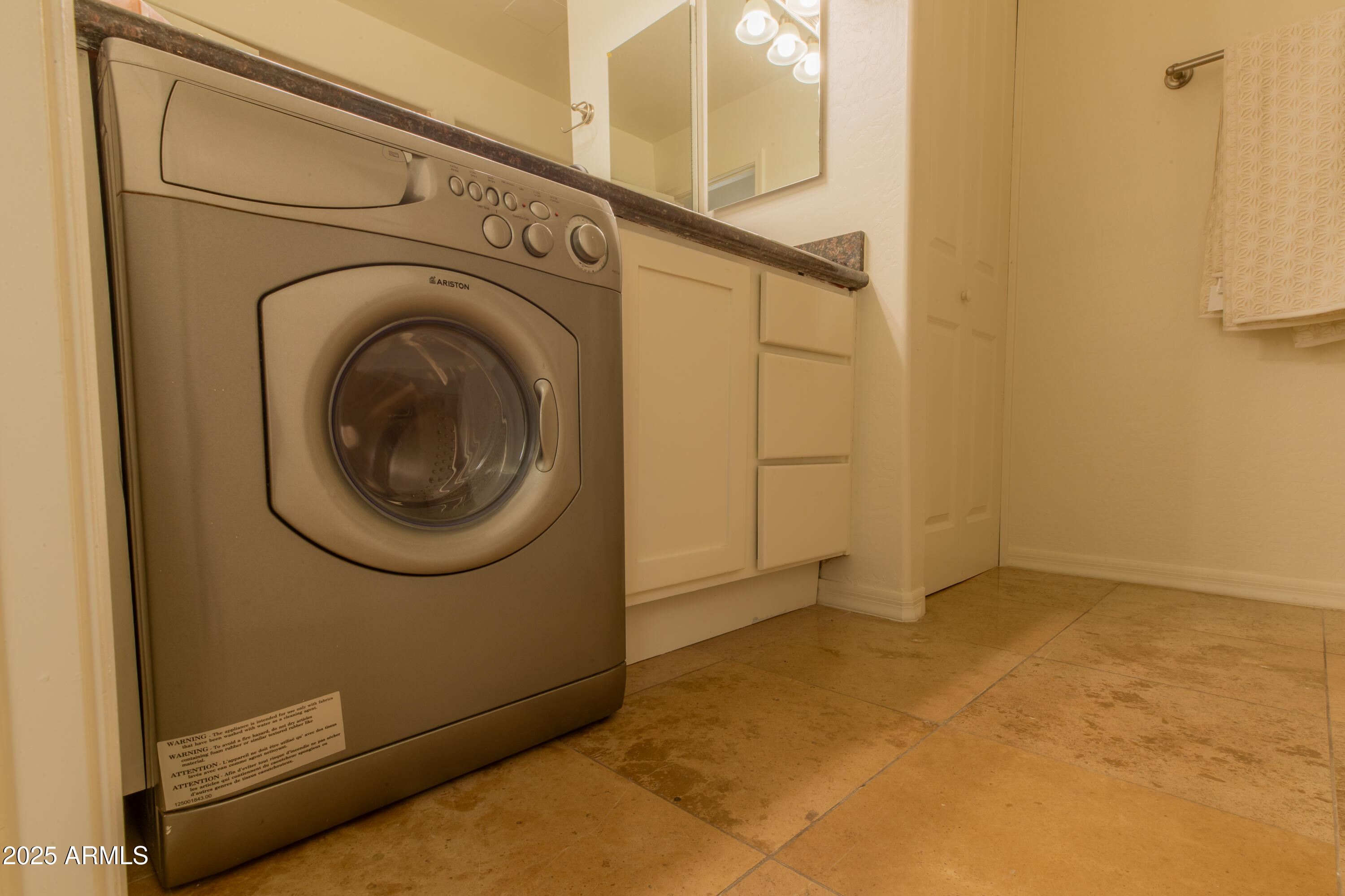 3619 East Monterosa Street, Unit 202 Phoenix, AZ 85018 - Photo 10 of 20 a view of a hallway with washer and dryer