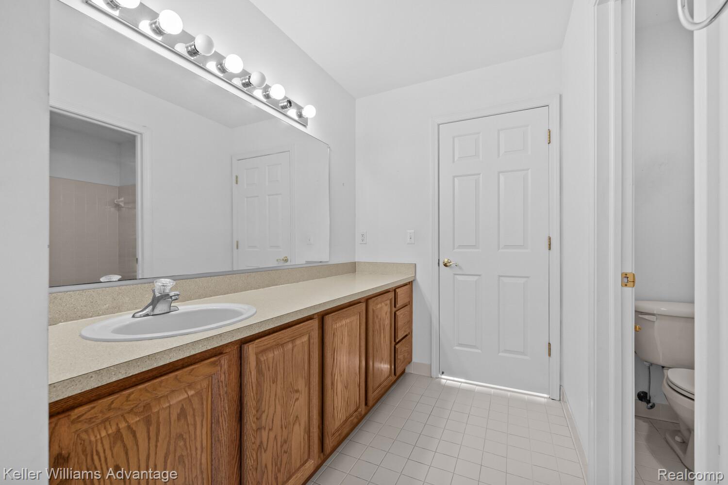 4100 Norwich Court Rochester, MI 48306 - Photo 45 of 72 Bathroom with vanity and light tile patterned floors