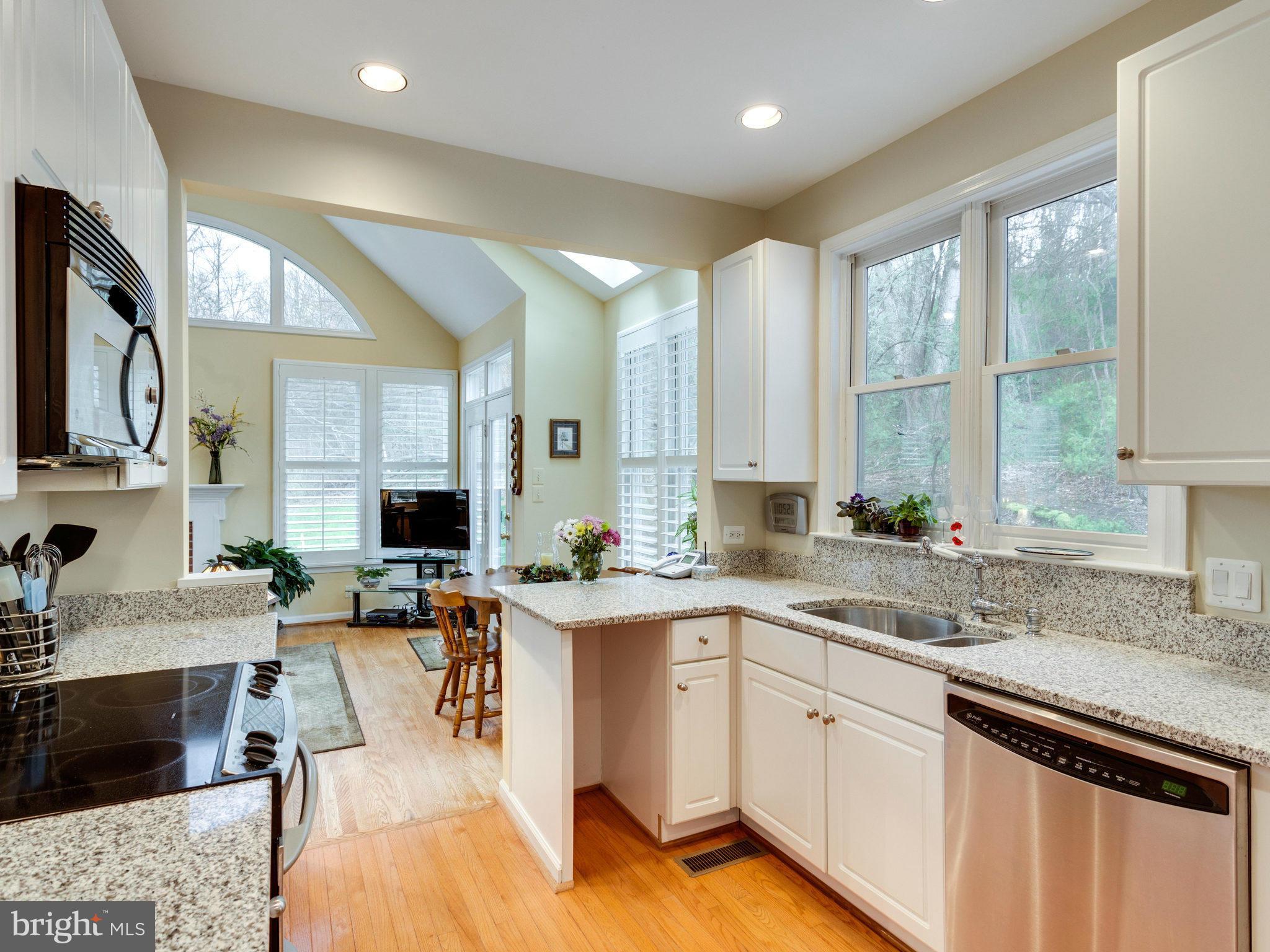 12515 Chapel Road Clifton, VA 20124 - Photo 11 of 30 a kitchen with lots of counter top space and a sink
