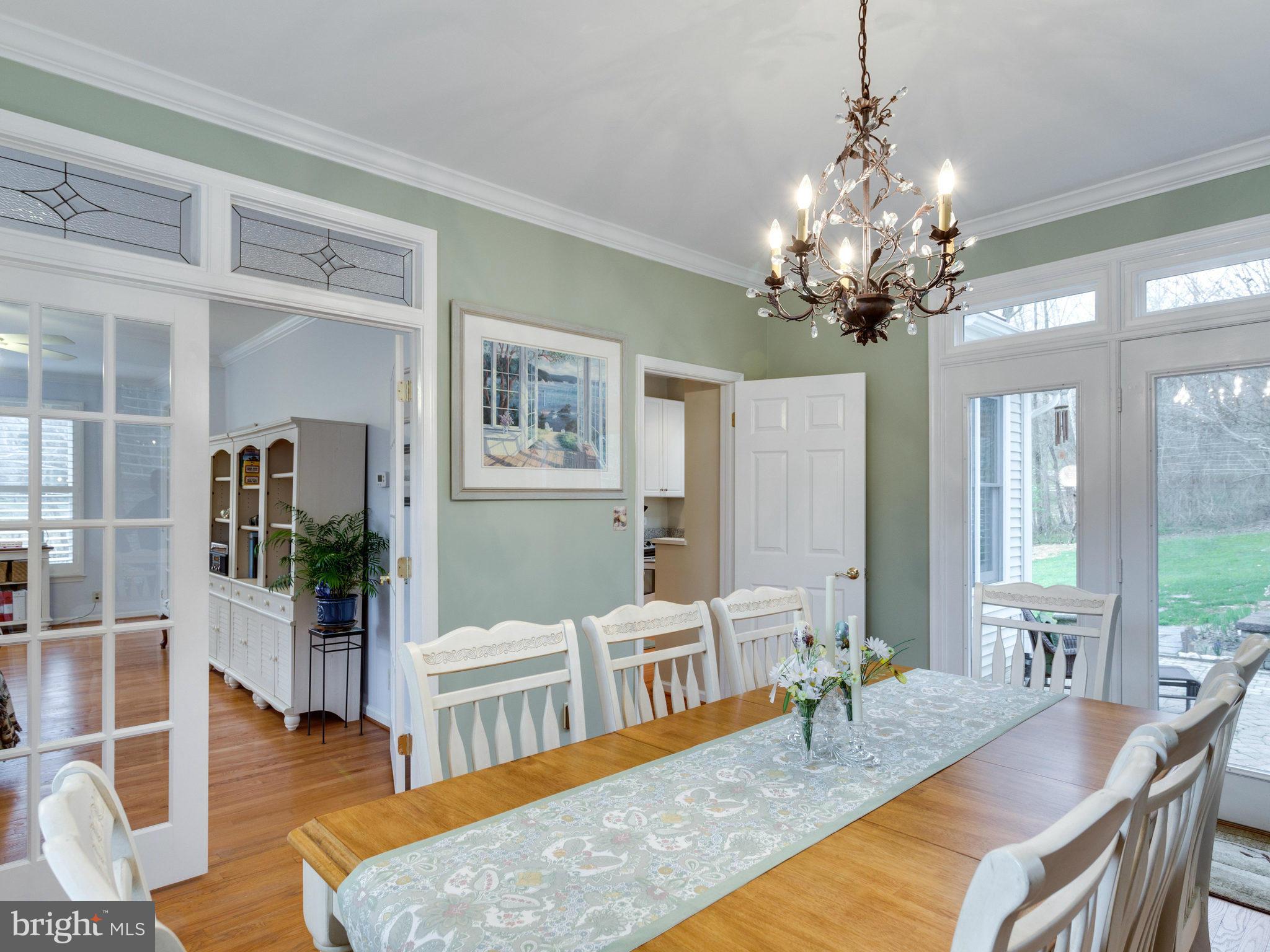 12515 Chapel Road Clifton, VA 20124 - Photo 13 of 30 a living room with fireplace furniture and a chandelier