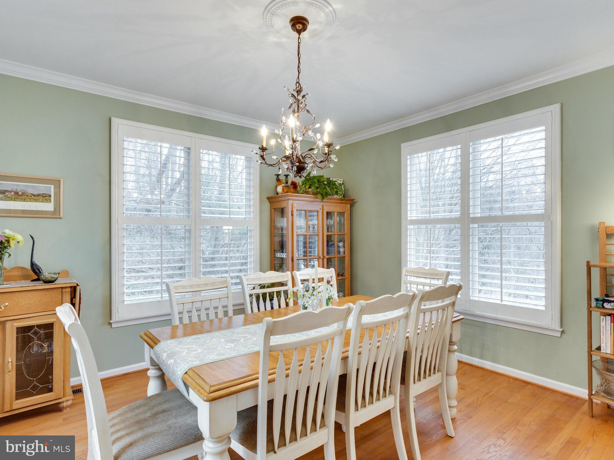 12515 Chapel Road Clifton, VA 20124 - Photo 14 of 30 a view of a dining room with furniture window and wooden floor