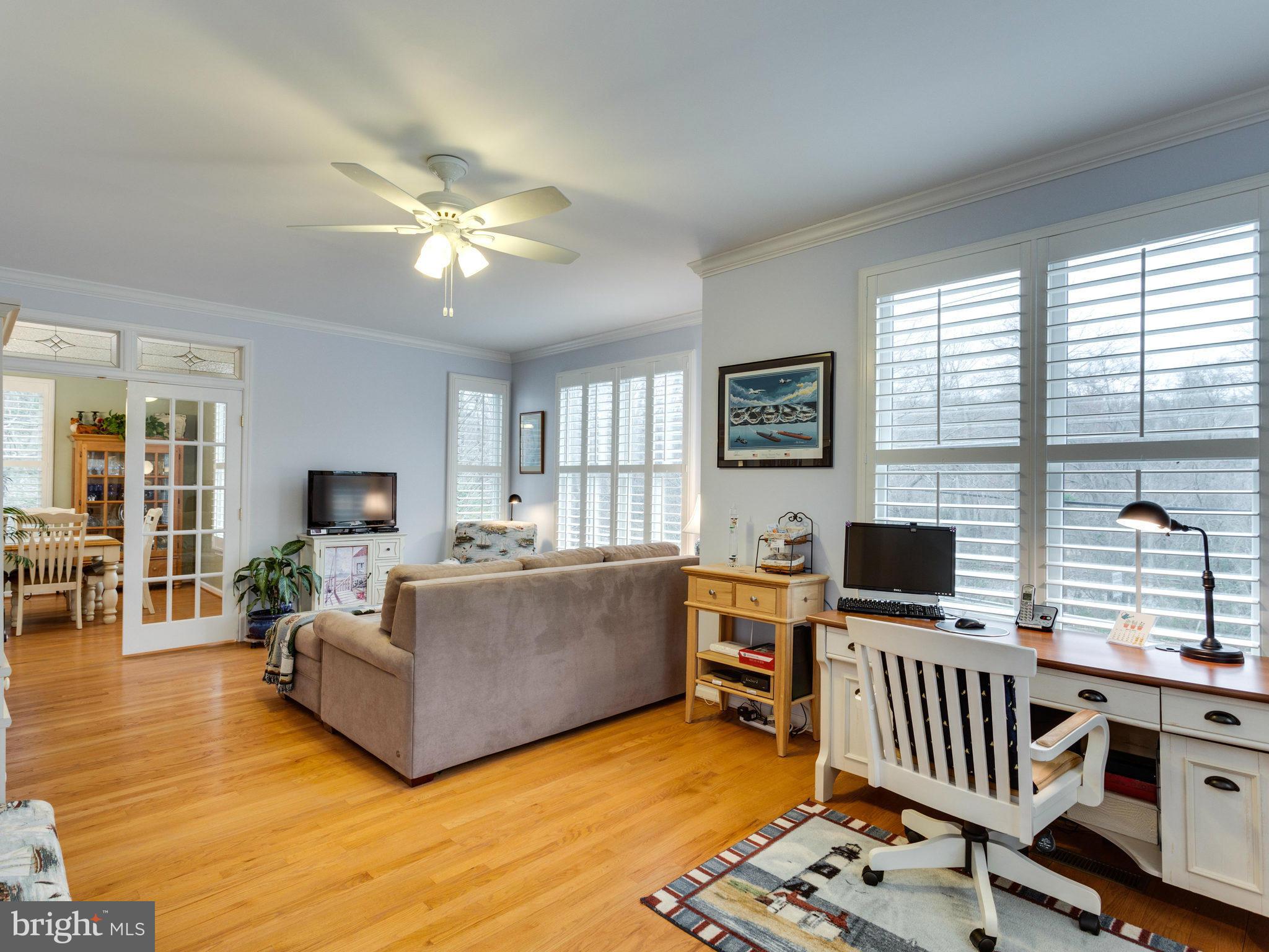 12515 Chapel Road Clifton, VA 20124 - Photo 18 of 30 a living room with furniture and a floor to ceiling window