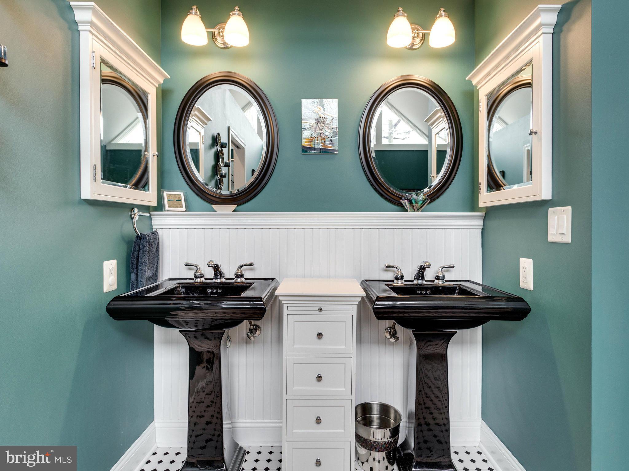 12515 Chapel Road Clifton, VA 20124 - Photo 23 of 30 a bathroom with a sink and a mirror