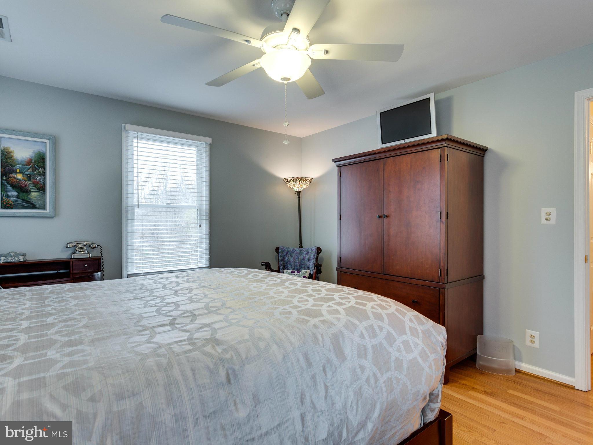12515 Chapel Road Clifton, VA 20124 - Photo 26 of 30 a bedroom with a bed and a window