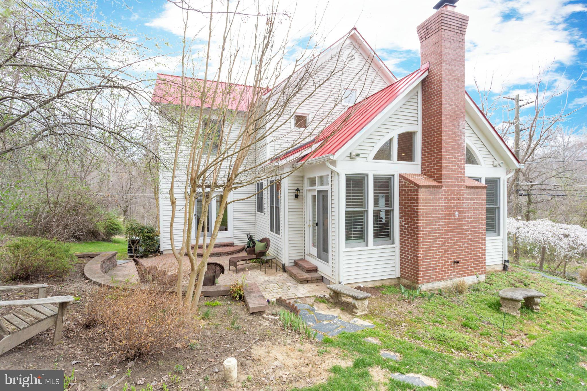 12515 Chapel Road Clifton, VA 20124 - Photo 4 of 30 a front view of a house with garden