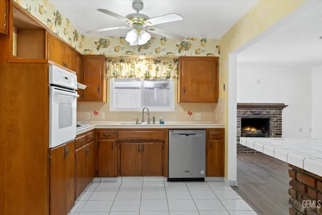 a large bathroom with a sink a large mirror and a bathtub