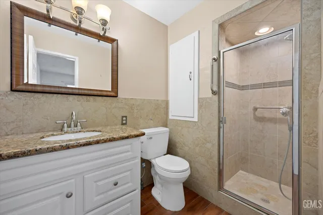 a bathroom with a sink a bathtub and shower