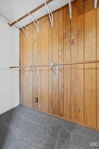 a view of swimming pool with a yard