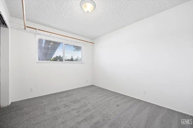 a view of swimming pool with a yard