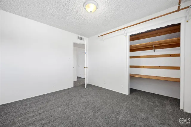 a house with swimming pool in front of it