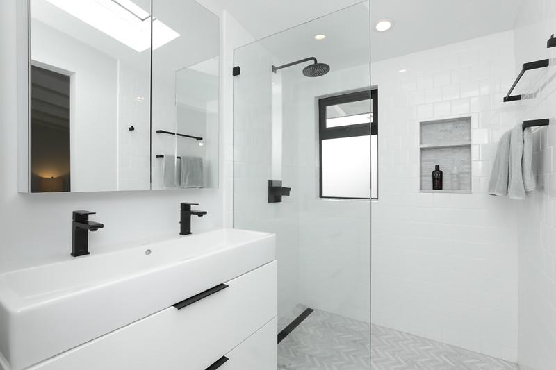 246 Hamilton Avenue Mountain View, CA 94043 - Photo 11 of 25 a bathroom with a sink a mirror and shower