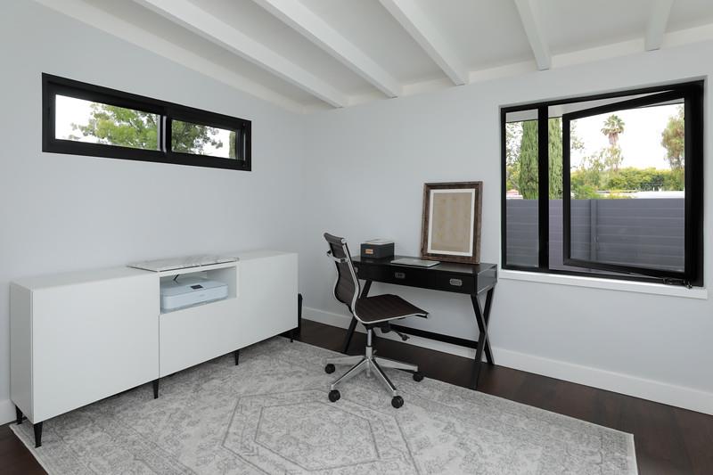 246 Hamilton Avenue Mountain View, CA 94043 - Photo 13 of 25 a view of a workspace with furniture and a window