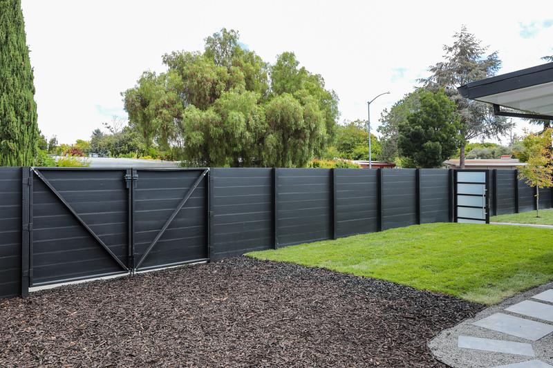 246 Hamilton Avenue Mountain View, CA 94043 - Photo 21 of 25 a view of a backyard with wooden fence