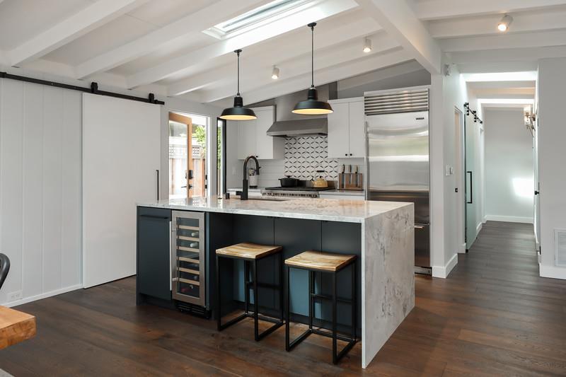 246 Hamilton Avenue Mountain View, CA 94043 - Photo 6 of 25 a kitchen with stainless steel appliances a sink stove and wooden floor
