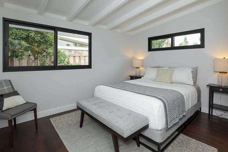 246 Hamilton Avenue Mountain View, CA 94043 - Photo 9 of 25 a bedroom with a bed and window