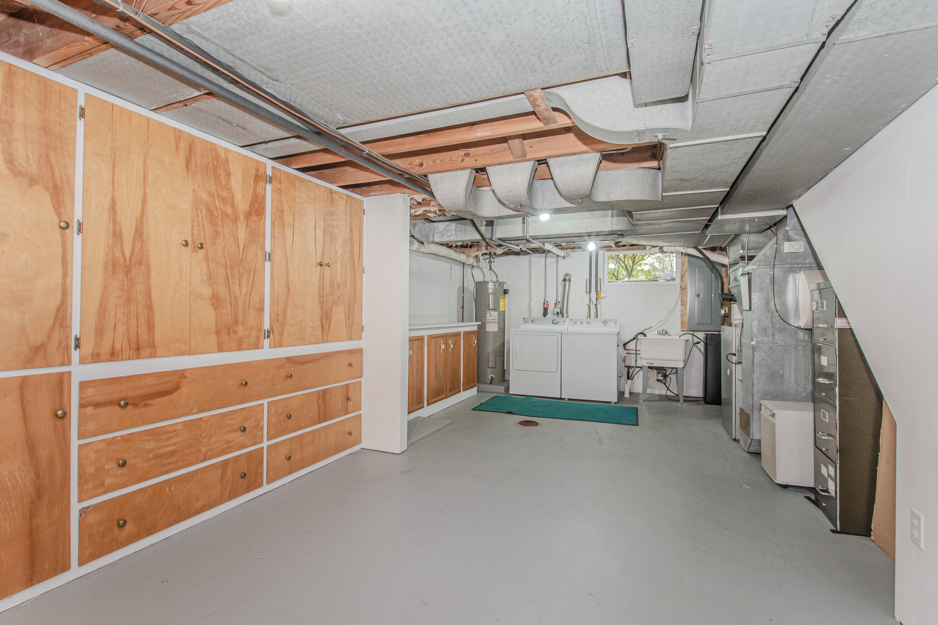 675 Mooreville Road Milan, MI 48160 - Photo 62 of 93 63 Basement storage