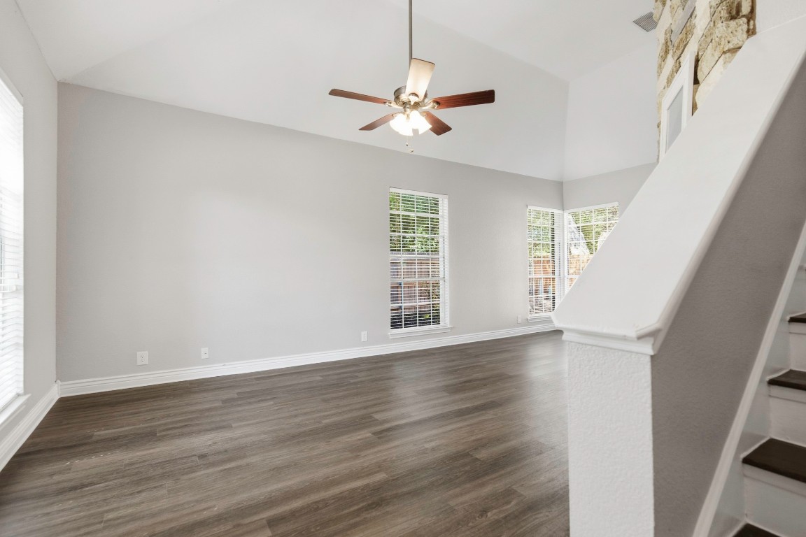 1108 Red Bird Drive Cedar Park, TX 78613 - Photo 13 of 30 a view of an empty room with wooden floor and a window