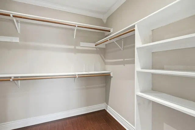 a view of an empty walk in closet