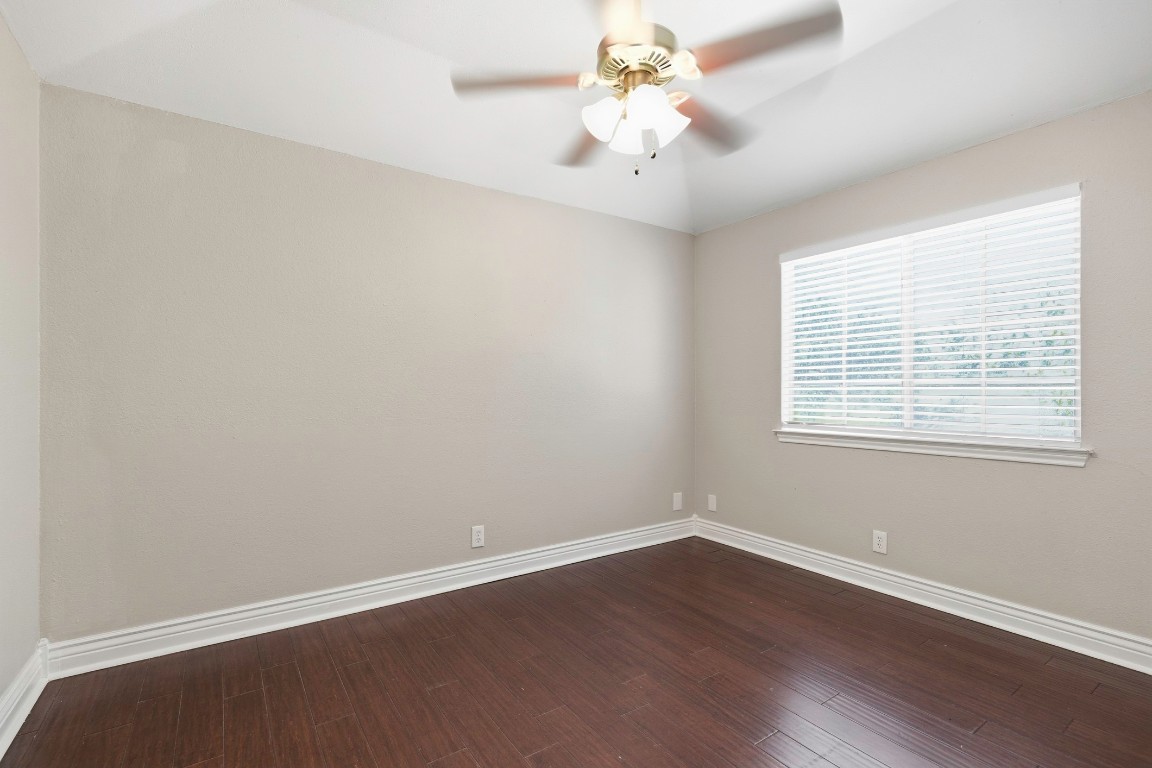1108 Red Bird Drive Cedar Park, TX 78613 - Photo 26 of 30 wooden floor in an empty room with a window