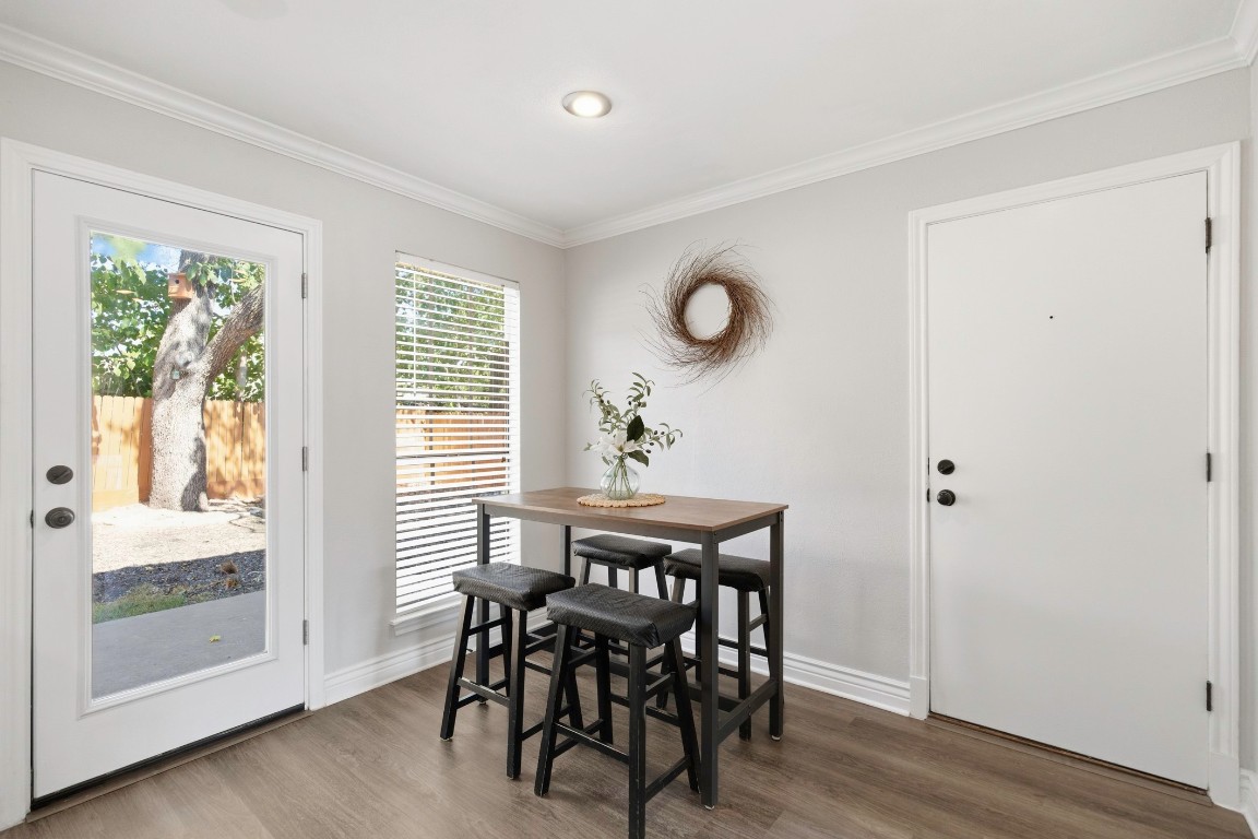 1108 Red Bird Drive Cedar Park, TX 78613 - Photo 10 of 30 a view of a dining room with furniture and wooden floor