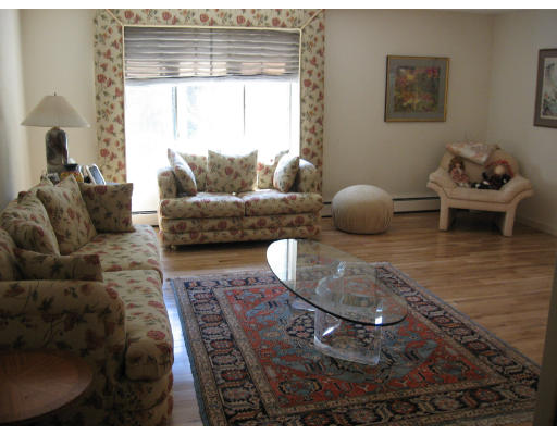 18 Preston Beach Road Marblehead, MA 01945 - Photo 4 of 11 a living room with furniture and a window