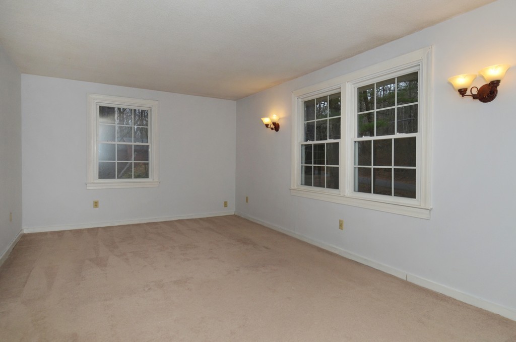 46 Old Mill Road Sutton, MA 01590 - Photo 20 of 23 a view of an empty room with a window