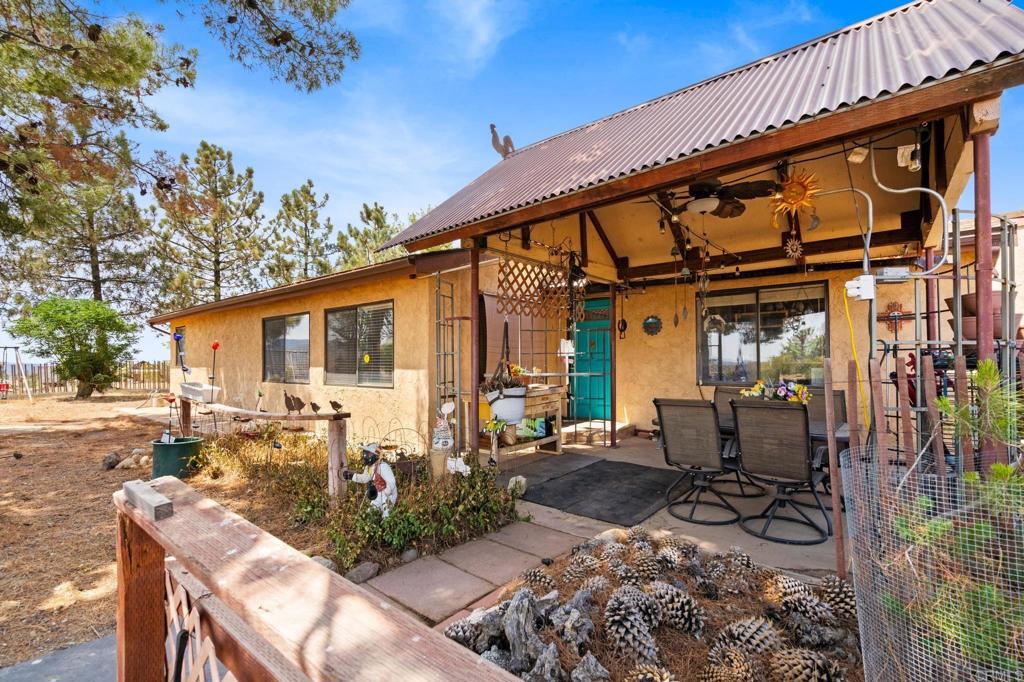 37852 Montezuma Valley Road Ranchita, CA 92066 - Photo 3 of 35 a view of a house with backyard sitting area and garden
