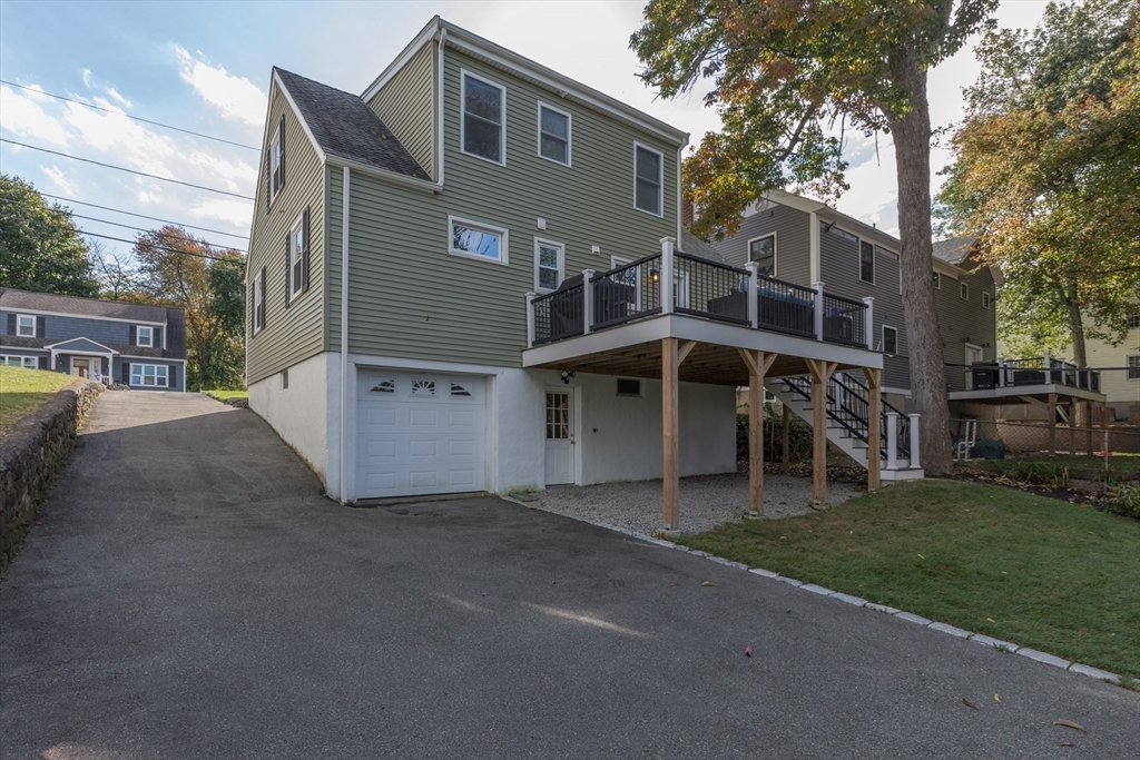 59 Florence Road Waltham, MA 02453 - Photo 2 of 20 a view of a house with a yard