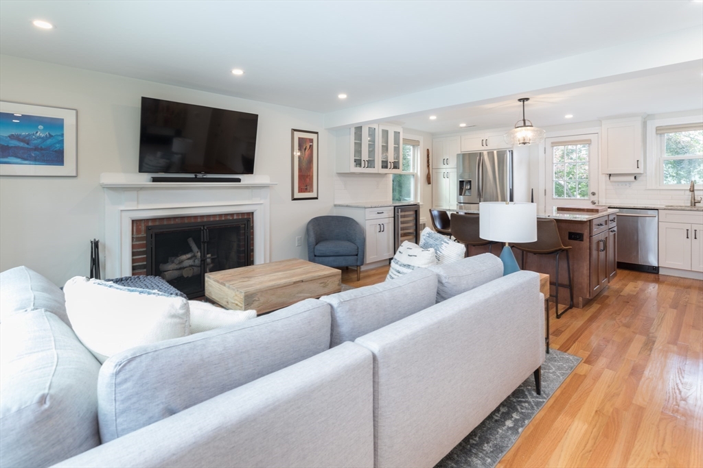 59 Florence Road Waltham, MA 02453 - Photo 5 of 20 a living room with furniture fireplace and flat screen tv