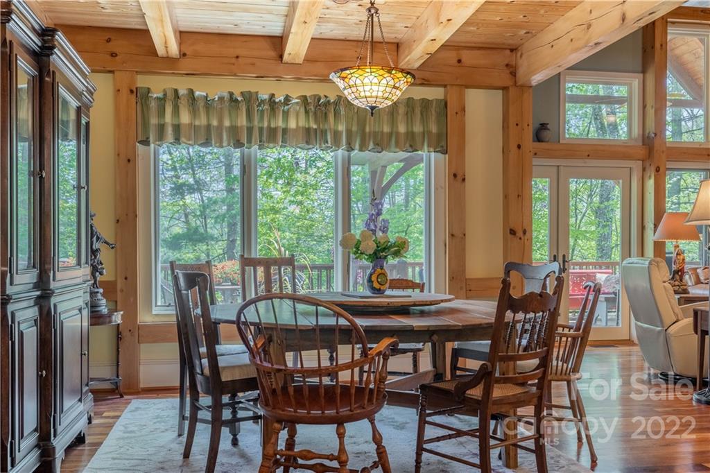 1553 Zacks Fork Road Lenoir, NC 28645 - Photo 13 of 48 a view of a dining room with furniture window and outside view