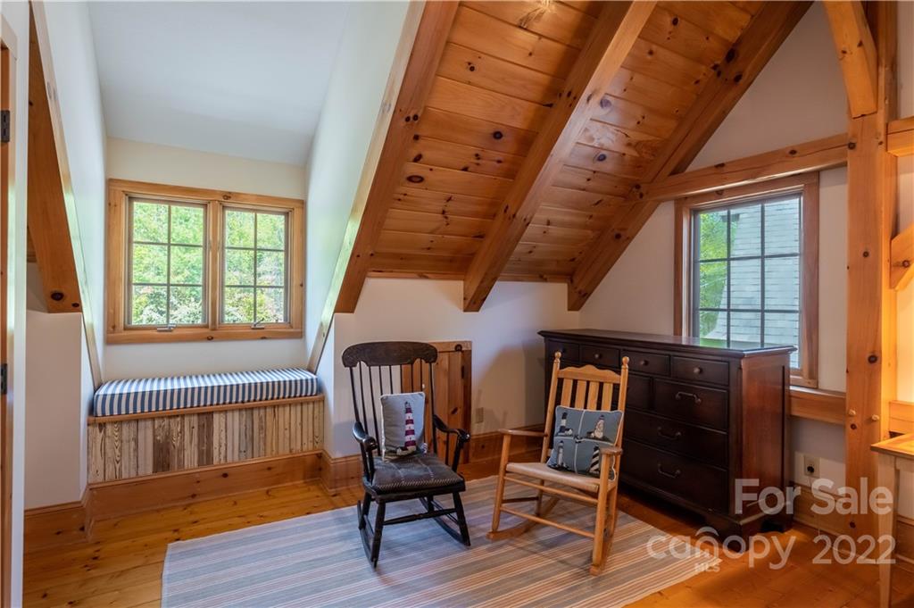 1553 Zacks Fork Road Lenoir, NC 28645 - Photo 23 of 48 a view of a dining room with furniture and wooden floor