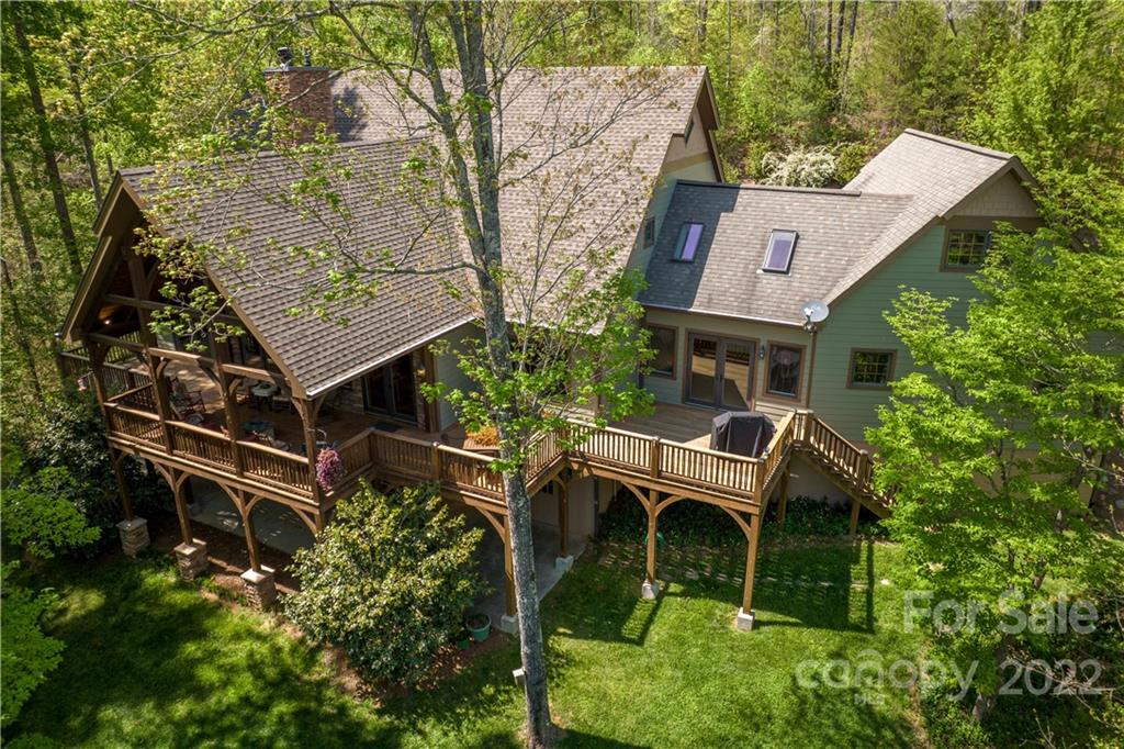 1553 Zacks Fork Road Lenoir, NC 28645 - Photo 3 of 48 an aerial view of a house with balcony and garden