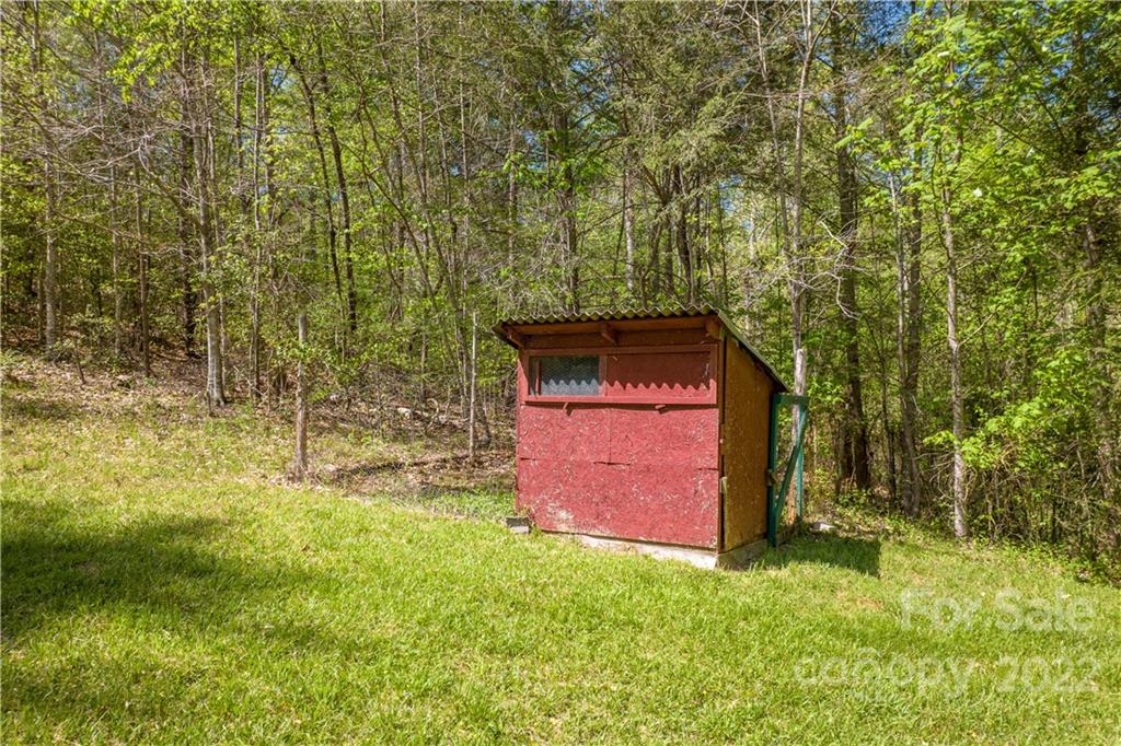 1553 Zacks Fork Road Lenoir, NC 28645 - Photo 39 of 48 a view of a wooden door and a yard
