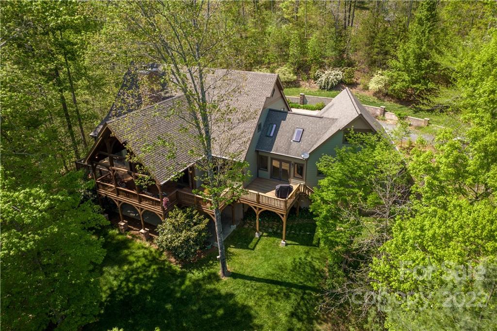 1553 Zacks Fork Road Lenoir, NC 28645 - Photo 40 of 48 an aerial view of a house with a yard and trees