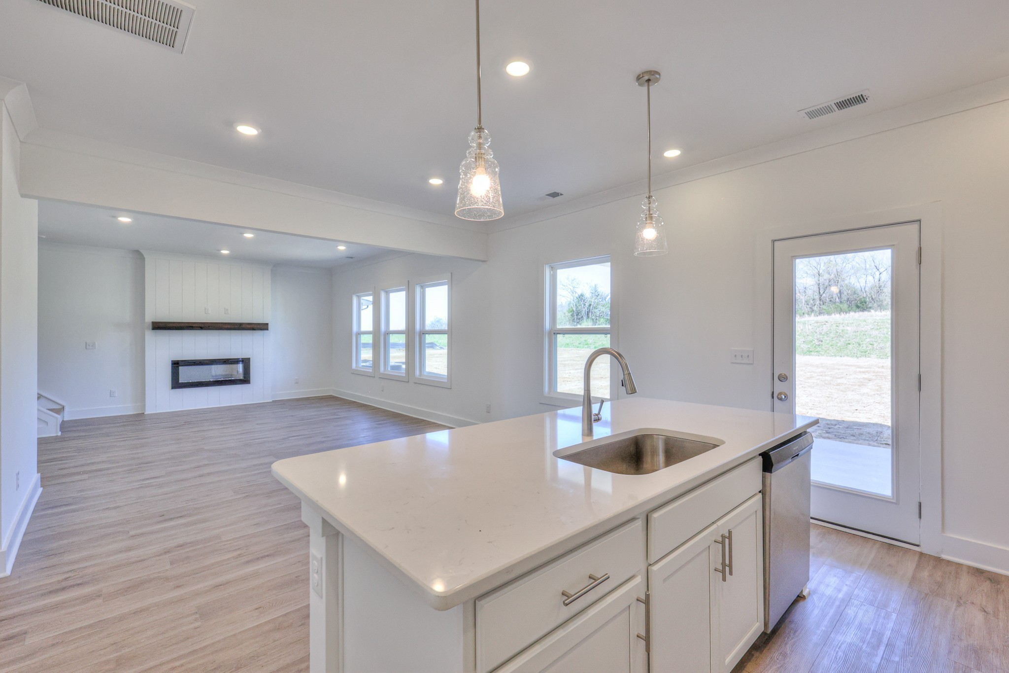 2259 Duchess Boulevard Gallatin, TN 37066 - Photo 14 of 44 a kitchen with kitchen island a sink stainless steel appliances and wooden floor