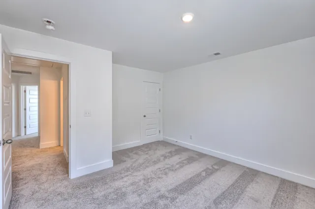 a bathroom with a sink vanity and a mirror