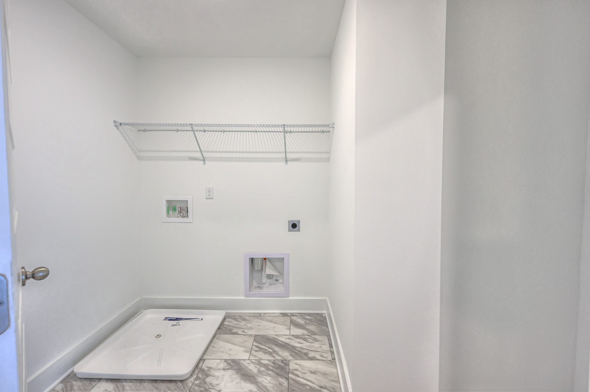 2259 Duchess Boulevard Gallatin, TN 37066 - Photo 28 of 44 a view of storage and utility room with racks on the wall