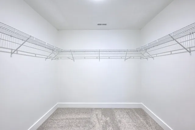 a view of a room next to a large window