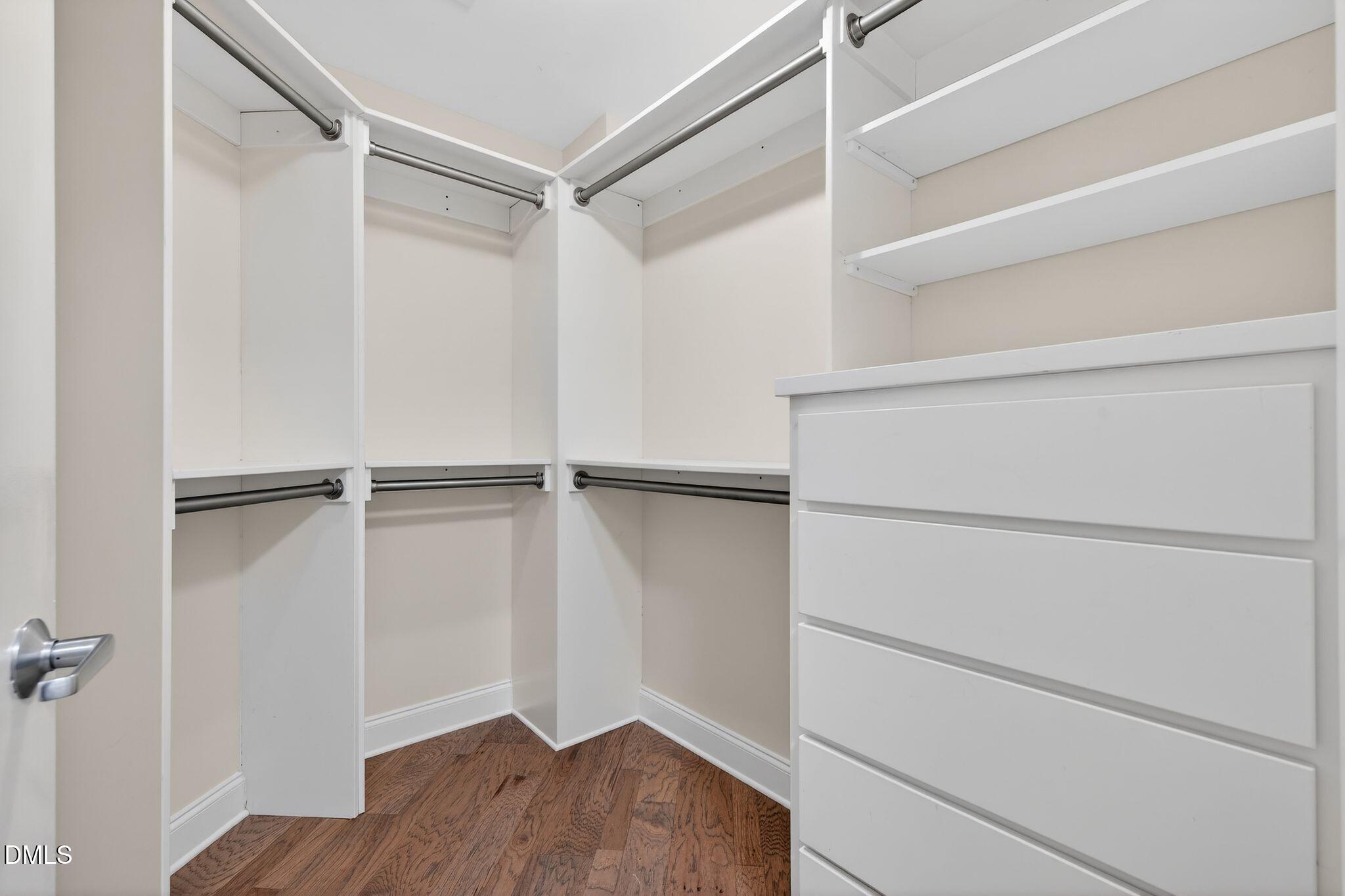 222 Glenwood Avenue, Unit 605 Raleigh, NC 27603 - Photo 27 of 60 a view of an empty walk in closet