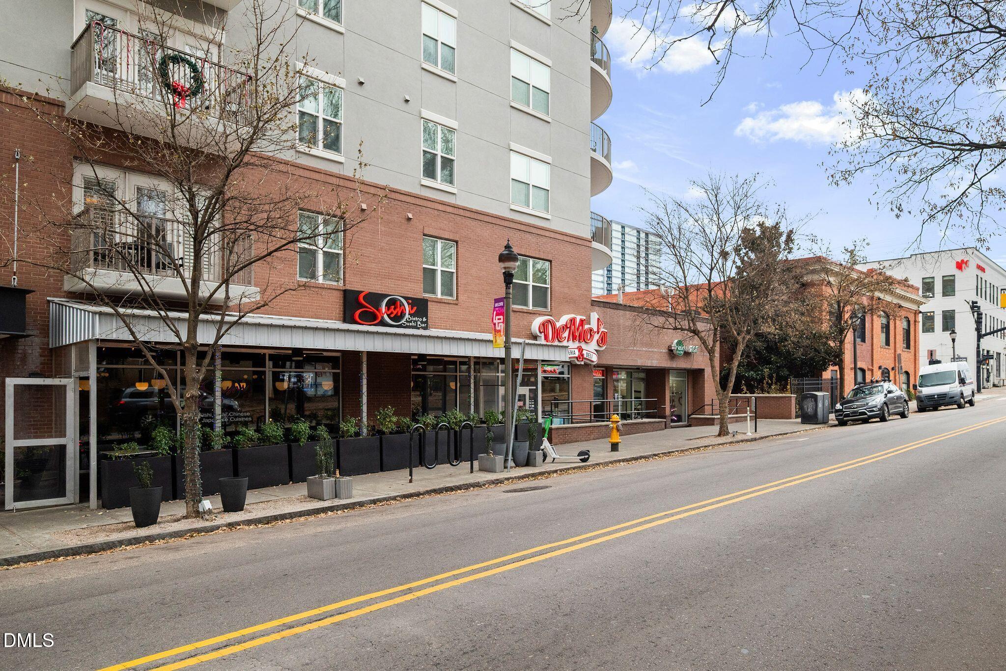 222 Glenwood Avenue, Unit 605 Raleigh, NC 27603 - Photo 34 of 60 a view of a street with stores