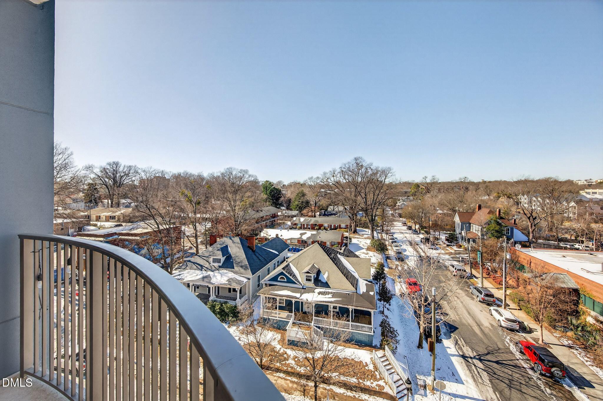 222 Glenwood Avenue, Unit 605 Raleigh, NC 27603 - Photo 48 of 60 a view of a city from a balcony