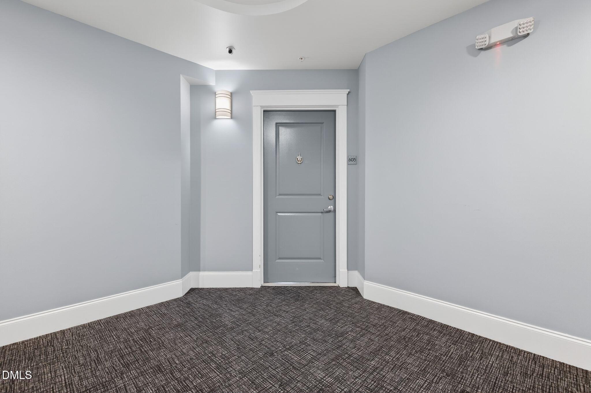 222 Glenwood Avenue, Unit 605 Raleigh, NC 27603 - Photo 50 of 60 a view of an empty room and closet area