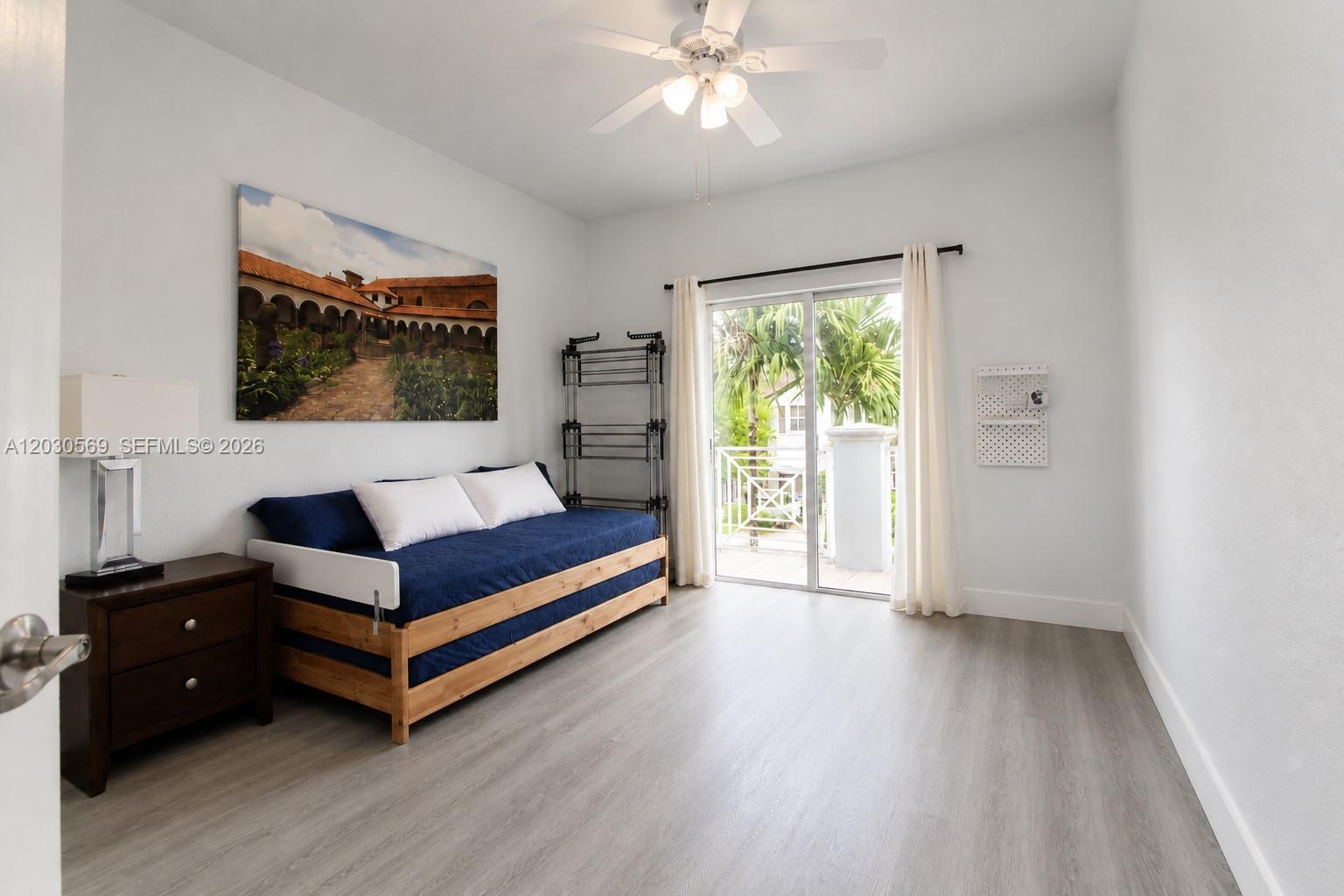 2564 Southwest 147 Path Miami, FL 33185 - Photo 18 of 31 Bedroom 3 with balcony.