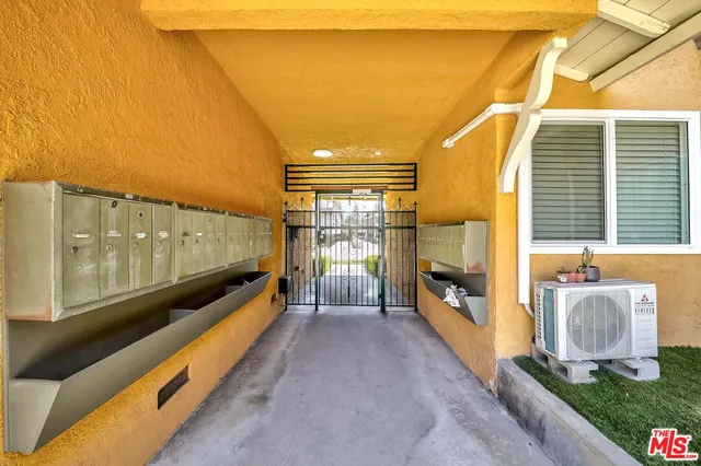 a view of a balcony with a patio