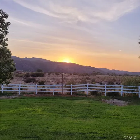 a view of outdoor space and yard