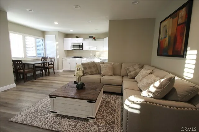 a living room with furniture and a table
